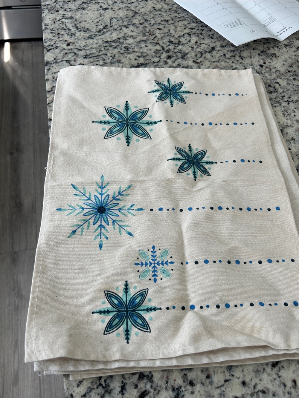 Cream Kitchen placemats with Blue Snowflake Design Six count